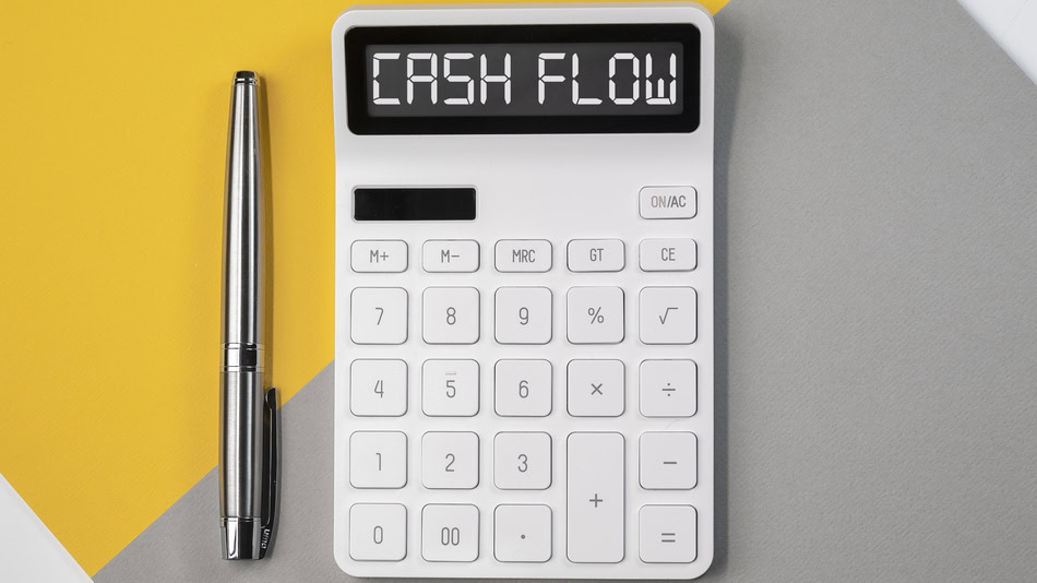 Cash flow (riesgo de liquidez) en la imagen de una calculadora